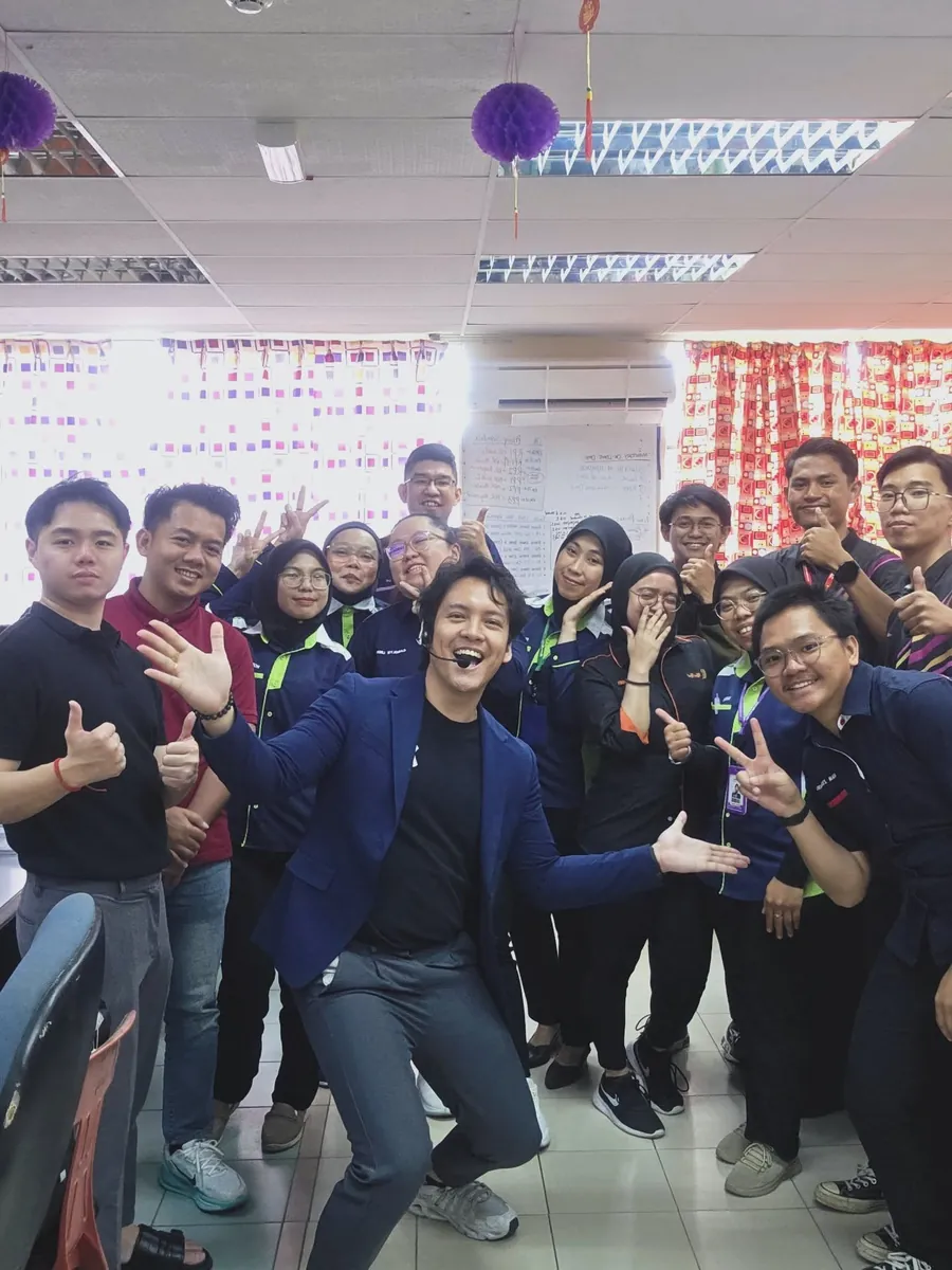 Participants celebrating together at the end of a past NextGen class.